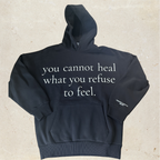 Black hoodie with motivational text on the front