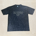 black shirt with motivational text on front