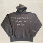 Brown hoodie with motivational text on the front.