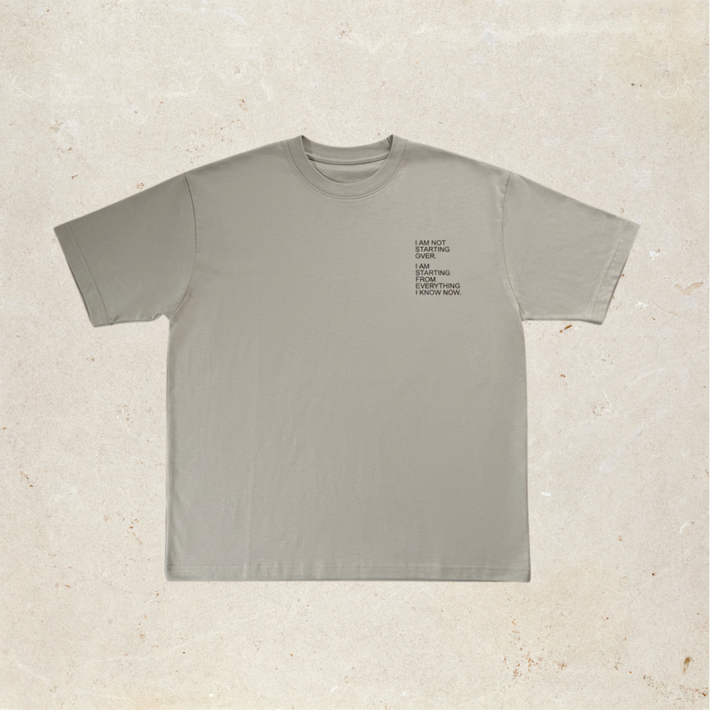 Grey t-shirt with text on the front