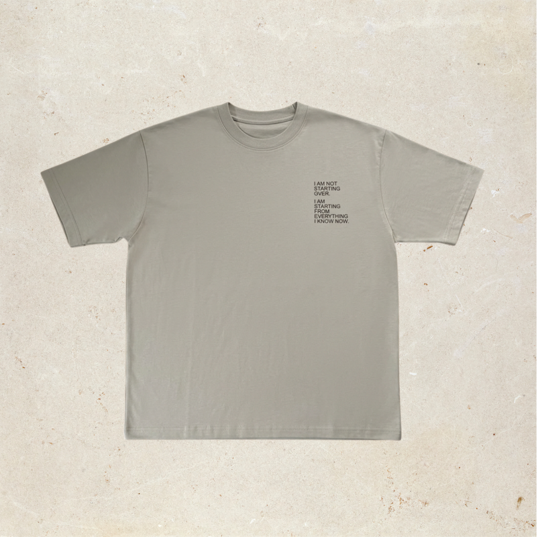 Grey t-shirt with text on the front