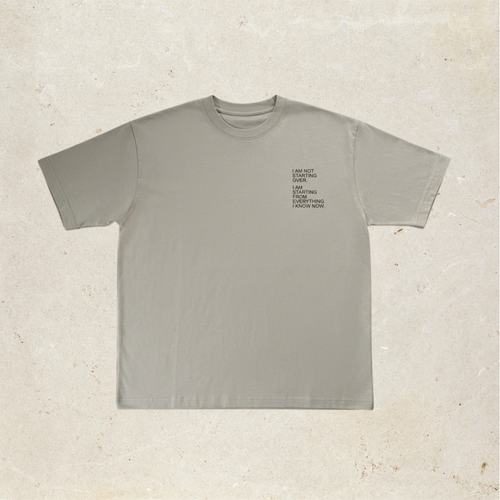 Grey t-shirt with text on the front