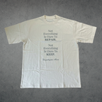pale off white t-shirt with text on the back